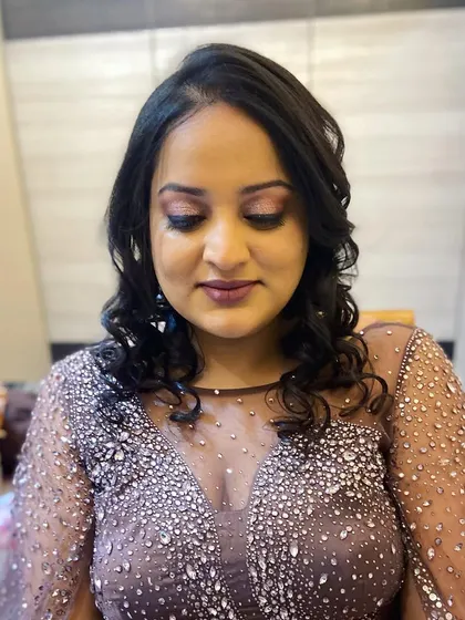A close-up of the eye makeup, showing the soft blend of colors.