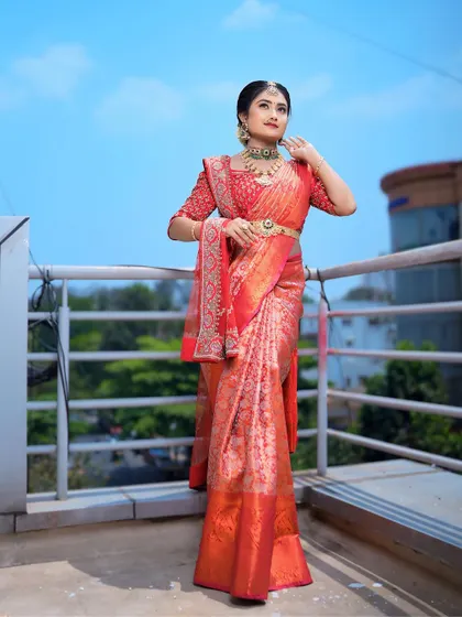 A full view of the bridal saree drape, showcasing the clean lines and secure fit. I ensure the pallu falls gracefully and the pleats are evenly distributed for a stunning silhouette from every angle.