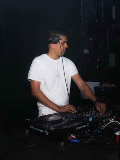 In the zone, focused on the mix in a darker, more intimate setting.