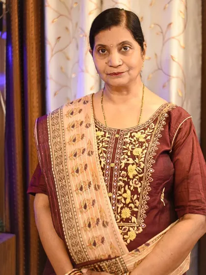 A classic, poised portrait capturing the elegance and tradition of the Karwa Chauth festival.