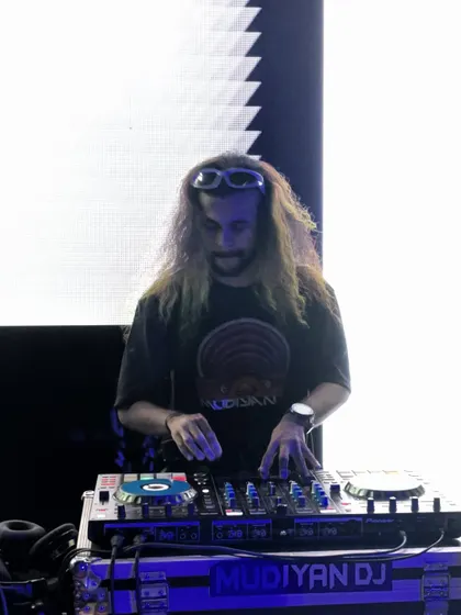 A shot of me concentrating on the mix, with my goggles pushed up on my forehead.