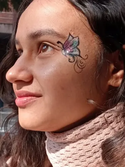 This butterfly combines pink, purple, and silver glitter for a multi-tonal, sparkling effect.