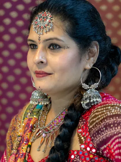 A detailed portrait showcasing the traditional jewelry and makeup for the Navratri look. I help clients with complete event-ready styling.