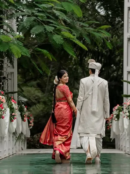 The bride's joyful entrance, a beautiful moment filled with anticipation and happiness. We capture the emotion as she walks towards her new beginning.