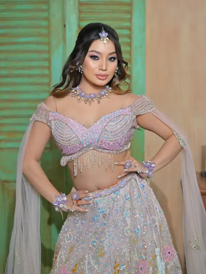 A powerful pose showing the full ensemble, perfect for an indo-western themed Mehendi or Sangeet.