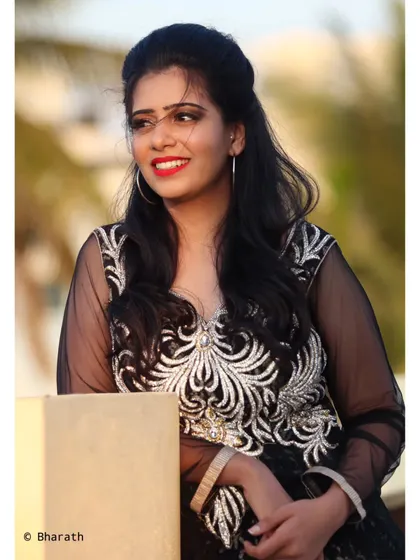 A smiling portrait that perfectly captures the joy of a beautiful evening. The golden hour light adds a magical touch.