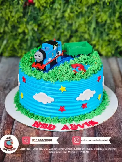 All aboard! A cute Thomas the Tank Engine cake for Advy's birthday. The bright blue train on a grassy field is a classic choice for toddlers.
