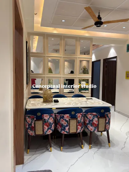 Another angle of the 4BHK dining area, highlighting the custom mirrored wall which reflects light and makes the entire space feel brighter and more expansive.