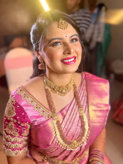 The perfect bridal glow. This image captures the beautiful highlight on the bride's cheeks and the bright, happy expression that my work aims to inspire.