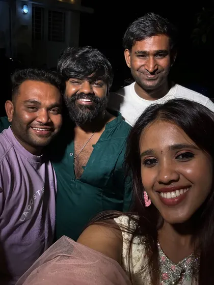 A happy selfie with the team and one of the performers after a great sangeet night.