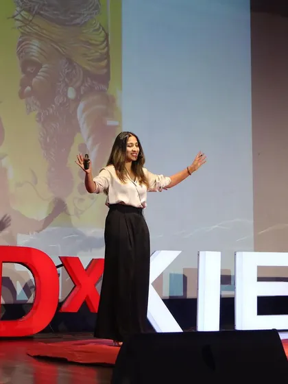 A powerful shot from my TEDx talk, where I shared my passion for storytelling and building community relationships through public art.