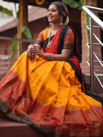 Another look from my South Indian themed photoshoot. The vibrant colours and traditional jewelry are a beautiful expression of our culture.