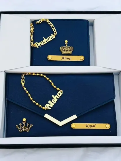 A perfect couple's gift set, featuring a personalized men's wallet and a matching women's clutch. Both items are customized with names and charms, making it an ideal Rakhi or anniversary present.
