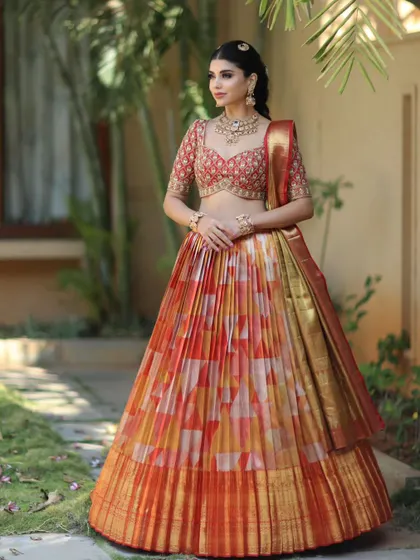 The full view of this unique lehenga look. It is a perfect blend of traditional fabric and modern styling.