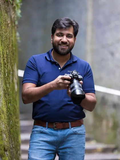 A little bit about me! Here I am, in my element, camera in hand and ready to capture your family's story. I believe my journey from the corporate world to full-time pet photographer helps me cherish and capture these moments even more.