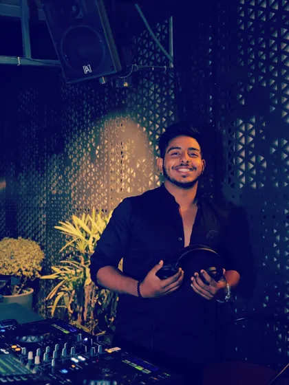 A happy moment behind the decks. I genuinely love what I do, and I think that joy and energy translate directly to the dance floor.