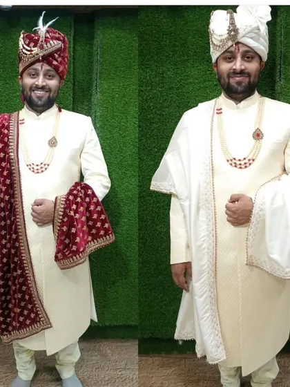 See the versatility of our classic cream sherwani. On the left, it's paired with a rich velvet maroon dupatta for a royal look, and on the right, with a simple white dupatta for a sober, elegant style.