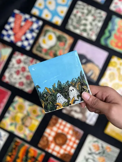 A sneak peek at our ceramic tile wall project! We gave students blank tiles and they came back with these incredible, hand-painted works of art.