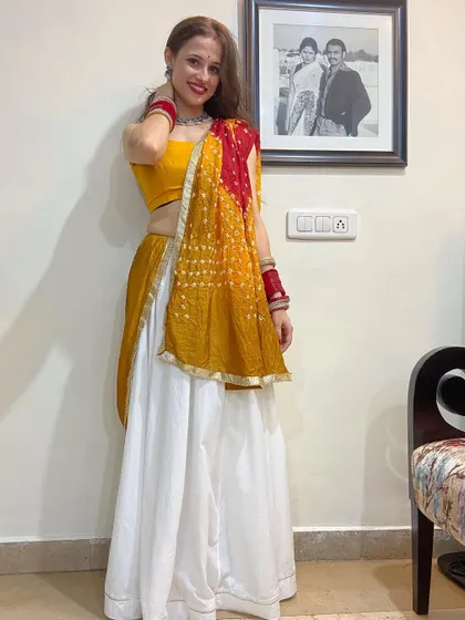 Another look at my Navratri attire. The right costume is key to a great performance, and I can help you style your look to perfectly match the choreography.