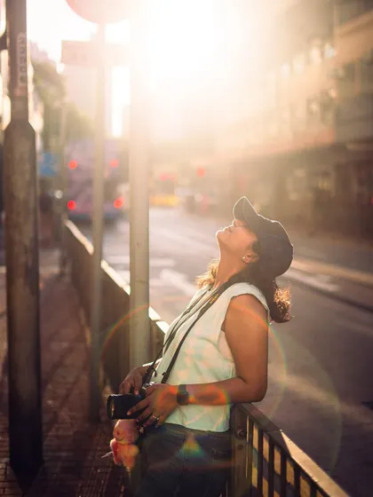 Soaking in the golden hour sunlight in Kennedy Town, Hong Kong. My husband took this photo, and it perfectly captures my happiness when I'm out shooting in beautiful light.