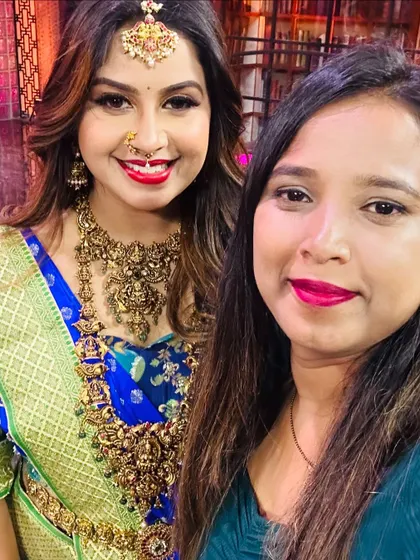 A selfie with a smiling actress in a beautiful blue saree and traditional gold jewellery.