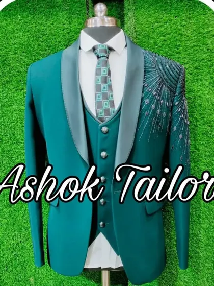 Another view of the teal suit with the beautiful peacock embroidery.