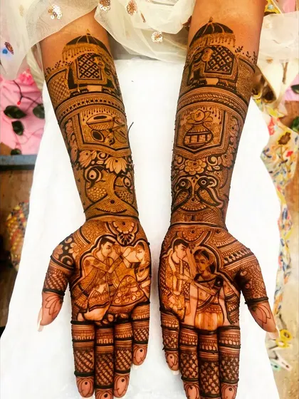 A vibrant bridal mehendi design that incorporates traditional wedding symbols like the kalash and doli alongside a sweet portrait of the couple. The use of animal motifs like fish and peacocks adds another layer of symbolism.