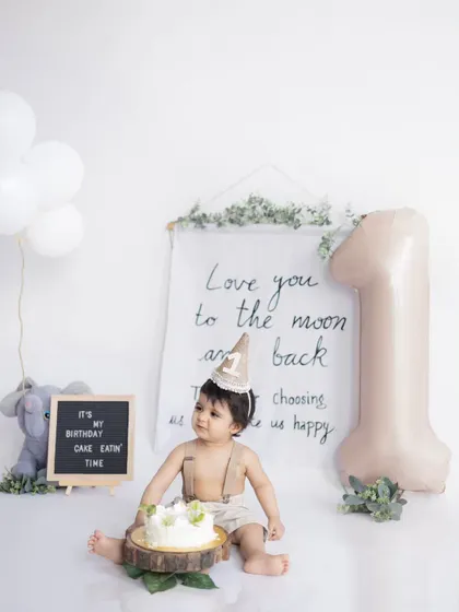 It's cake eatin' time! The little party hat is on and the cake is ready. We capture the entire story of the cake smash, from the anticipation to the messy fun.