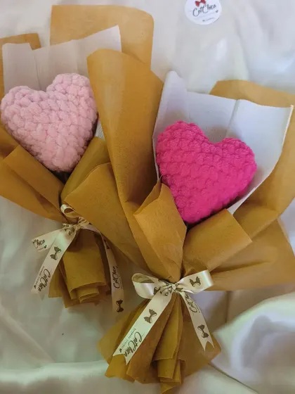 Our crochet heart bouquets are a sweet and plushy alternative to traditional flowers, available in light pink and magenta.