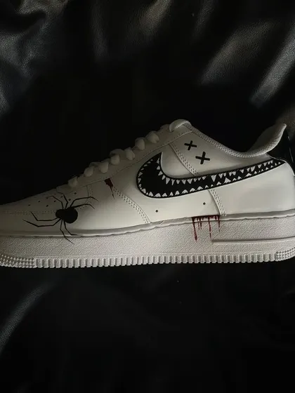 The other side of the Halloween custom sneaker, with a spider detail.