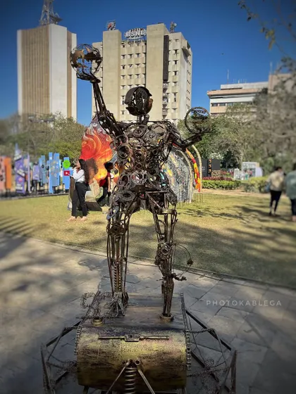 A sculpture made from scrap metal, showcasing the ingenuity of the artists. My photos highlight the texture and detail of these unique creations.