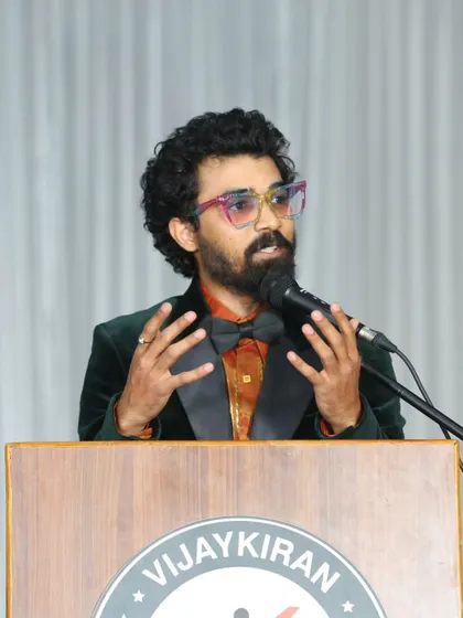 A close-up of me speaking at the Vijaykiran Group of Institutions' event. Clear communication and stage presence are key to a successful corporate or school event.