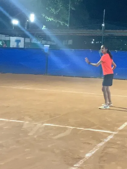 A young athlete getting ready for the next shot during an evening game. The court provides a safe and professional environment for our junior players.