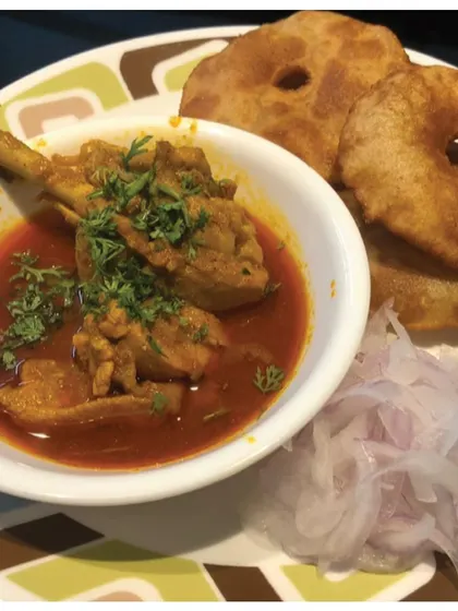 Malvani Chicken Rassa, a staple Sunday dish from Malvan, Maharashtra. This second-generation recipe, known for its rich coastal flavors, connects two generations through a love for this comforting curry.