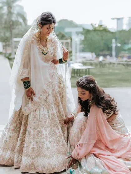 Another beautiful sister moment, helping with the final touches.