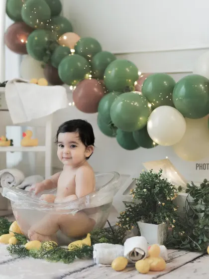 Splish, splash, it's a baby in a bath! Our tub-time setups are a fun way to end a session, always resulting in lots of giggles and cute photos.