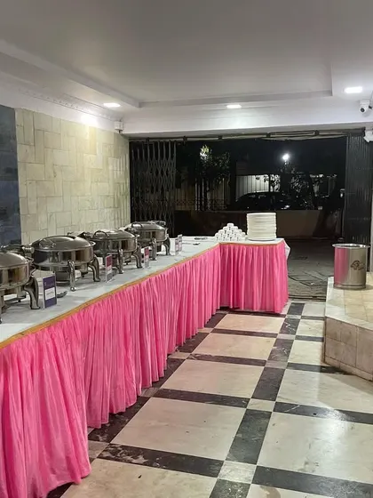 The complete buffet setup for a society event, ready for guests to arrive.