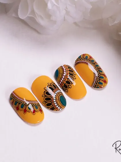 A lovely, bright shot of my yellow mandala designs, perfect for a sunny day or a festive celebration.