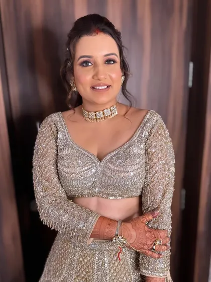 Annie's happy smile shows how confident and beautiful she feels in her reception glam.