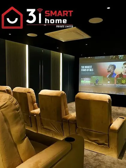 This perspective from the side shows how the tiered seating provides an excellent view of the screen, making it a perfect setup for watching sports or movies with family and friends.