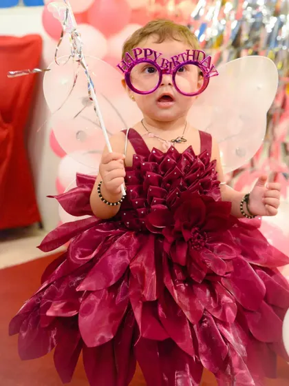 Capturing the wonder and excitement of a one-year-old at her birthday party.