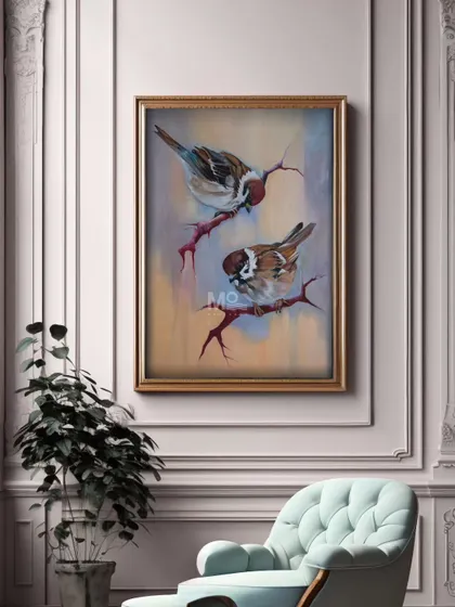 A beautifully framed painting of two birds hangs in an elegant room, showcasing how art can complete a space. Our collection of oil on canvas paintings is designed to complement luxury interiors with unmatched sophistication.