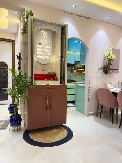 This unique rotating mandir is a perfect solution for saving space. It can be turned to face the living area or tucked away for a cleaner look.