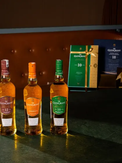 This group shot for The Glen Grant showcases their range of whiskies alongside their gift packaging. The moody lighting and rich textures of the location create a sophisticated atmosphere perfect for their Diwali campaign.
