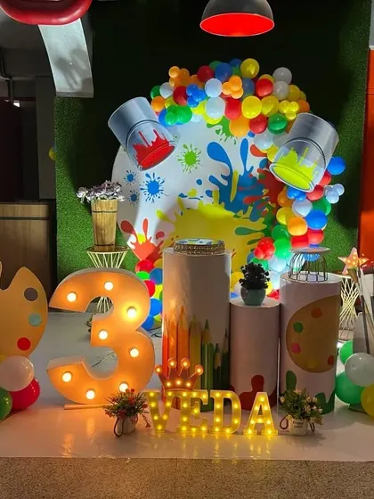 A slightly different angle of the art party decor, showing the fun and creative elements.