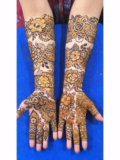 A detailed floral design perfect for an engagement or festival. The mix of bold flowers and delicate filler work creates a balanced and beautiful look.