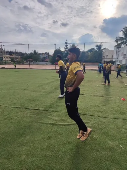 Players performing jumping exercises as part of their fitness routine. We build explosive power and stamina, which are crucial for both batting and bowling.