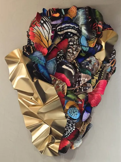 A recent butterfly art installation for a stunning home, where the golden steel and colorful wings complement the modern interiors by Amit Porwal.