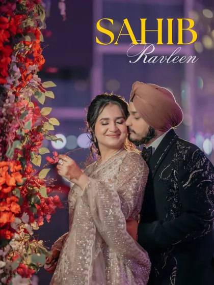 An embrace that feels like home. We seek out these tender, heartfelt moments during your celebrations, where a gentle kiss and a happy sigh tell a story of deep affection and comfort, beautifully framed by floral splendor.
