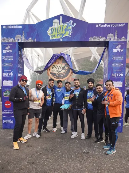 The whole crew at the Dilli 10K run finish line. We are proud to foster a community that supports each other's fitness journeys.